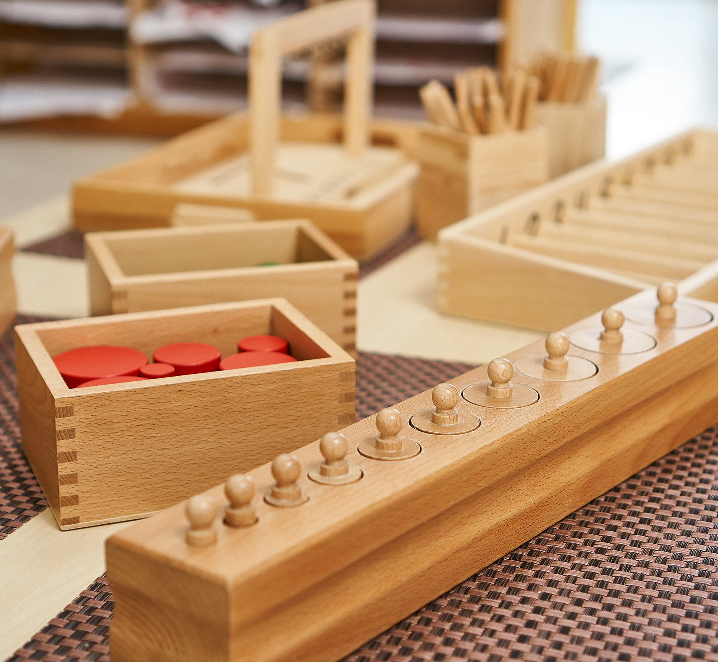 Wooden Montessori educational toys on table.